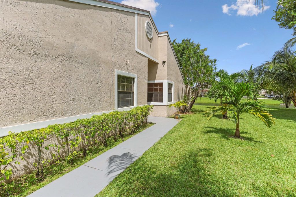 Photo of 5041 NW 11 Way, Deerfield Beach, FL 33064 (MLS # R10904256)