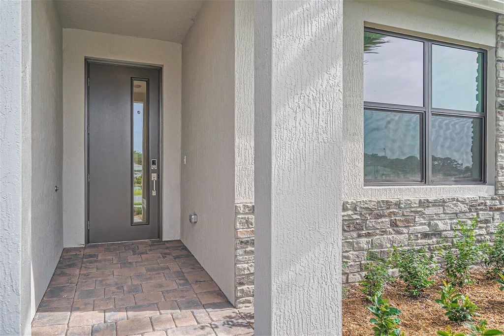 Photo of 1490 SW Lago Circle, Palm City, FL 34990 (MLS # R10938509)