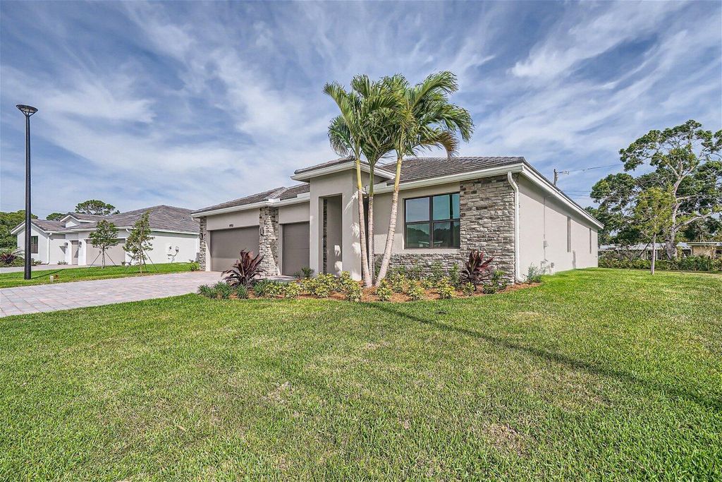 Photo of 1490 SW Lago Circle, Palm City, FL 34990 (MLS # R10938509)