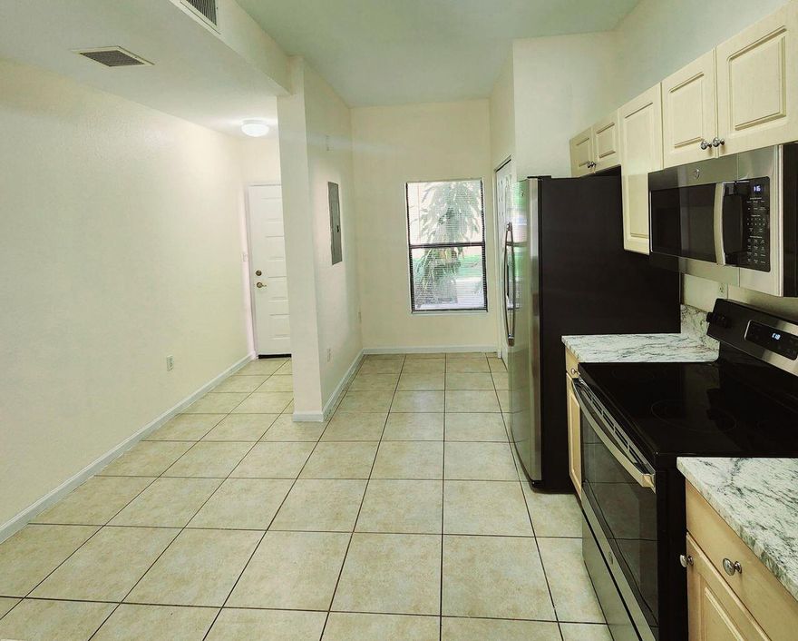 Enjoy comfortable living in this spacious 2-bedroom, 2-bathroom 1st floor condo. This end unit is sought after because of the extra *Bonus* room perfect for a den/playroom/home office. Updated Eat-in kitchen with granite counters, New modern stainless steel appliances , and a handy pantry for additional storage ! Both bathrooms have been updated with new vanities & shower doors. Tile flooring throughout and Washer/Dryer is locat3ed inside of the unit. (1) assigned space #101 conveniently located in front of unit. Per Assoc. a minimum of 675 credit score is required for approval.