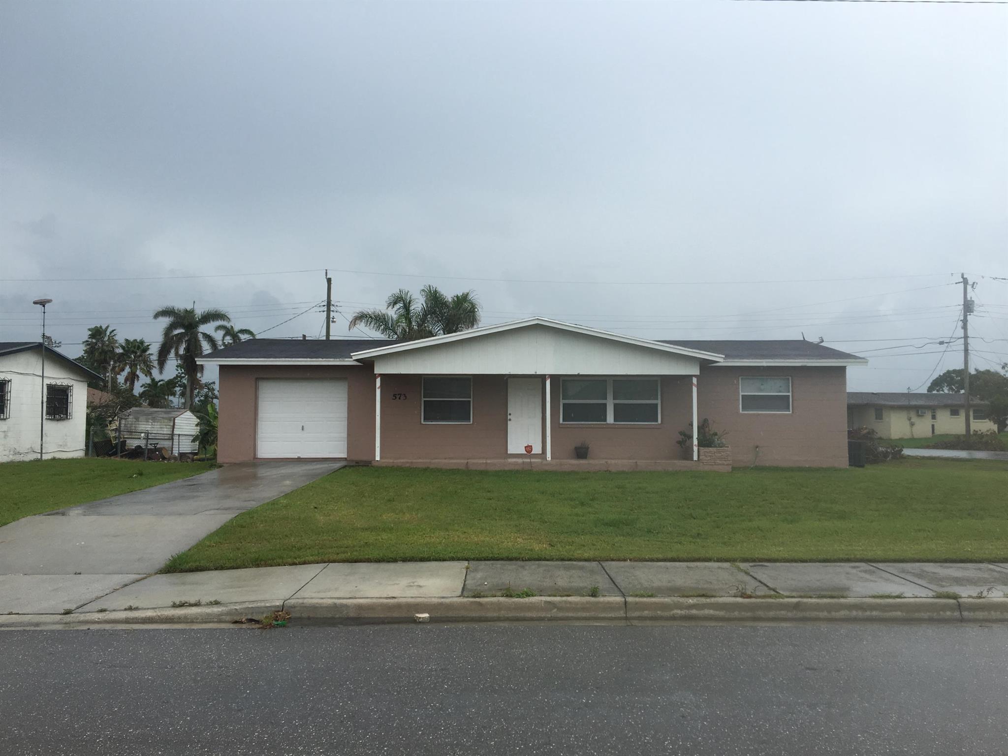 Cute and cozy home with 3 bedrooms and 2 full bathrooms, open concept with living and dining combination, lots of natural light, ceiling fans and fully tiled through out. Additional amenities are one car garage, washer and dryer hook ups and a large backyard.