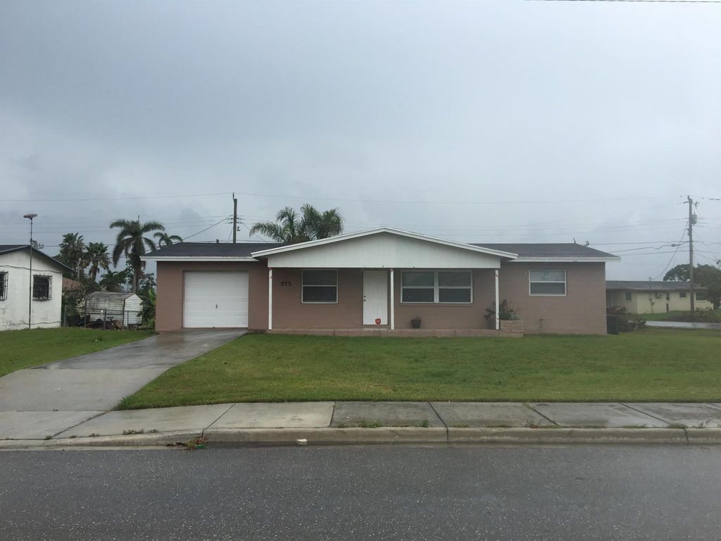 Photo of 573 SW 14th Street, Belle Glade, FL 33430 (MLS # R11001430)