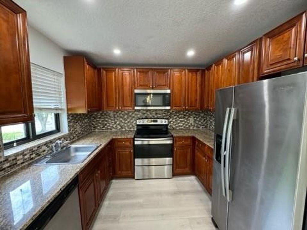 Photo of 11660 NW 45 Street #4, Coral Springs, FL 33065 (MLS # F10534749)