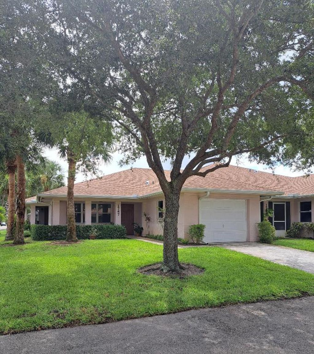 Photo of 1747 N Dovetail Drive #A, Fort Pierce, FL 34982 (MLS # R11104941)