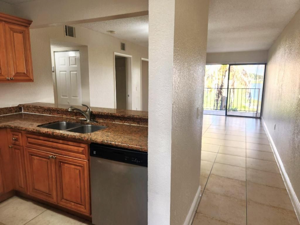 Photo of 1520 Lake Crystal Drive #F, West Palm Beach, FL 33411 (MLS # R11148952)
