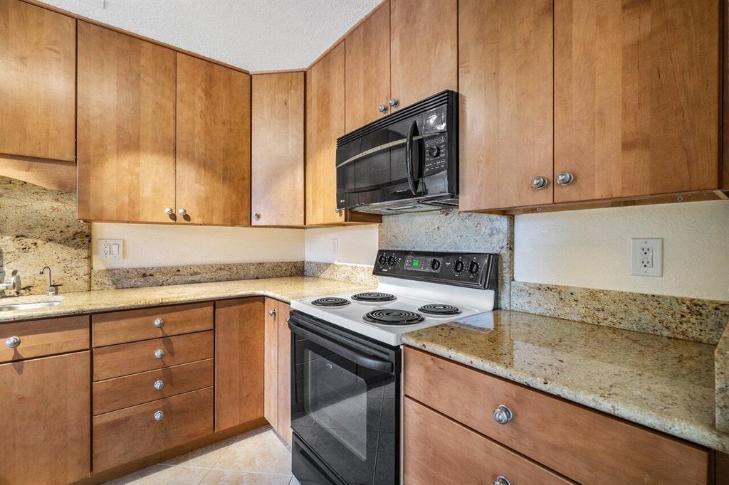 A beautiful, well maintained, corner unit condo in the sought after Pines of Delray West. Association requires age of 55+. Tons of natural lighting and space. The property boasts close proximity to everything you need in Delray Beach with world class amenities at Pines of Delray West. This well appointed 2 bedroom, 2 bathroom has everything you need. Brand new, beautiful wood laminate flooring in master bedroom just installed, tile flooring throughout condo, all windows adorned with beautiful, white plantation shutters, 2021 refrigerator, 2021 A/C unit, beautifully updated kitchen, brand new in unit washer and dryer, and all other appliances are about 5 years old. Landlord maintains appliances, has a semi-annual maintenance for A/C servicing, and pest control for the unit.