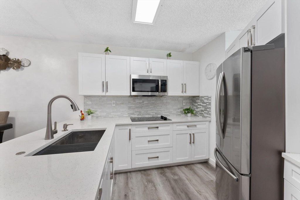 Photo of 3807 Victoria Drive NE #3807, West Palm Beach, FL 33406 (MLS # R11131796)