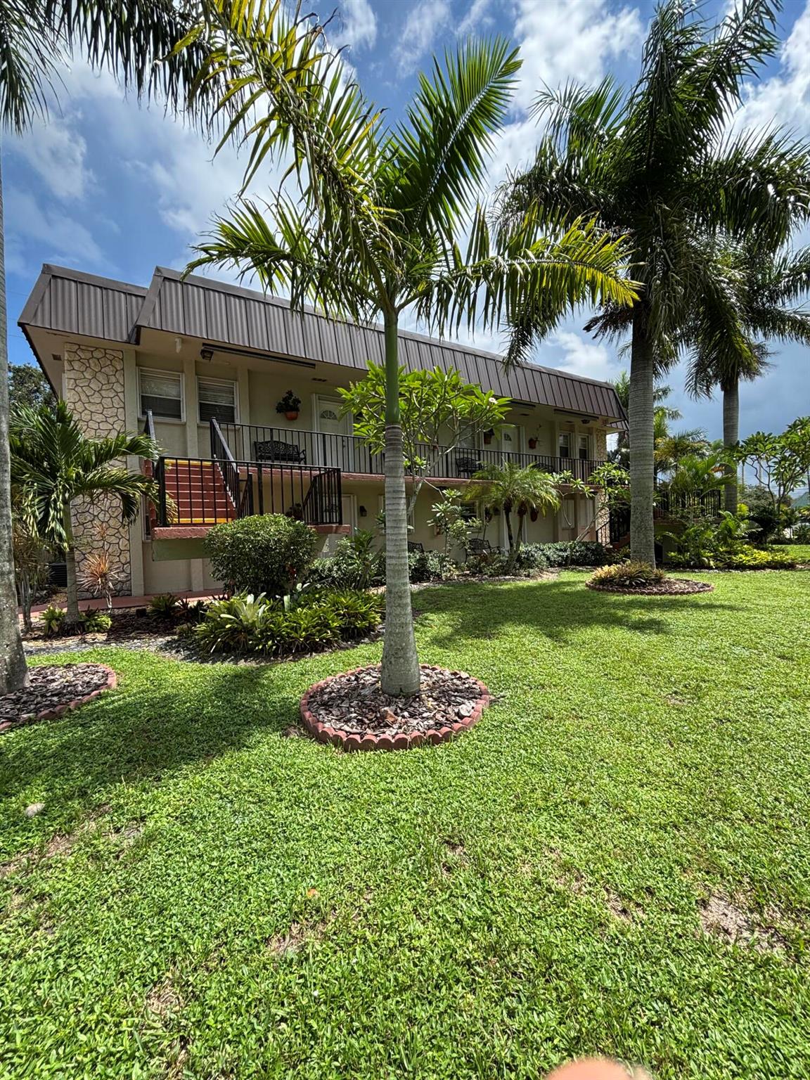 Welcome to this charming and meticulously cared-for condo located in the heart of Jupiter. Featuring 2 spacious bedrooms and 1.5 baths, this warm and inviting home is tastefully decorated throughout, creating a cozy and welcoming atmosphere.Step outside and enjoy the lush landscaped grounds, offering a serene and picturesque setting. Whether you're relaxing indoors or taking in the beauty of the community, you'll feel right at home.Conveniently situated just minutes from major highways, shopping centers, and only 15 minutes from the stunning blue waters of the Treasure Coast beaches, this location offers the perfect blend of tranquility and accessibility.Don't miss the opportunity to live in this serene location.