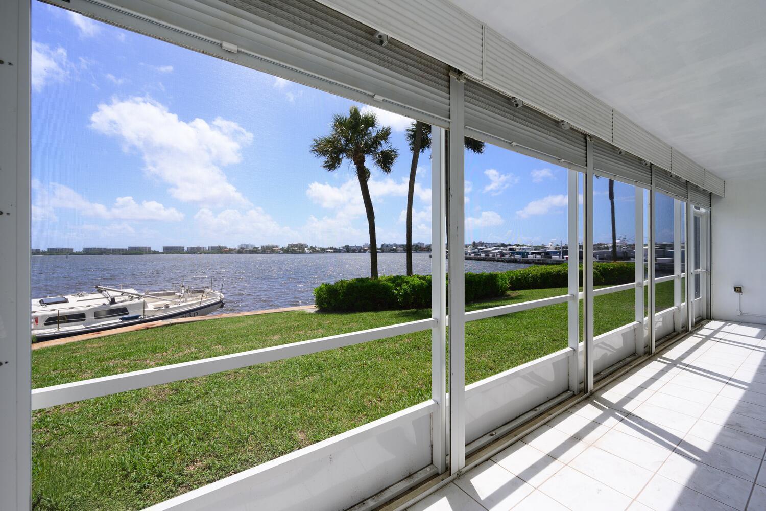 Experience fabulous, unobstructed panoramic intracoastal water views from this first-floor 2-bed, 2-bath haven! The spacious screened patio beckons, accessible from both the living room and master bedroom. A convenient patio door opens directly to the common lawn, exclusive to first-floor residents. The interior features neutral ceramic tile flooring throughout. The new open modern kitchen features white shaker cabinets, granite countertops, and is also equipped with brand-new stainless appliances. Enjoy the convenience of an included washer and dryer. Parking space #17. This vibrant community offers a refreshing pool, clubhouse, library, game room, and fitness center. Pet friendly building. Ideally located just minutes from world-class shopping centers, restaurants, and Lantana beach!