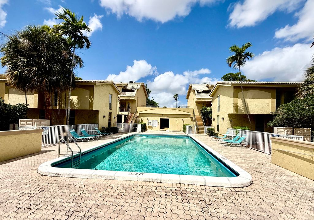 Photo of 8401 W Sample Road #21, Coral Springs, FL 33065 (MLS # B26014103)