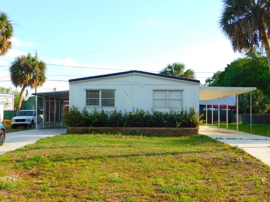 Photo of 5013 Margaret Ann Lane, Fort Pierce, FL 34946 (MLS # R10873087)