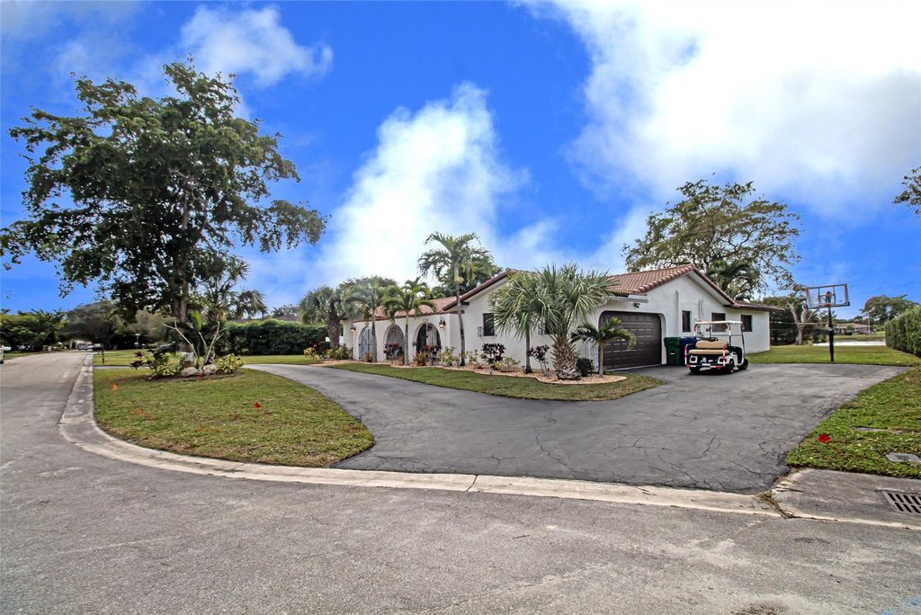 Photo of 11035 NW 26th Dr, Coral Springs, FL 33065 (MLS # F10532924)