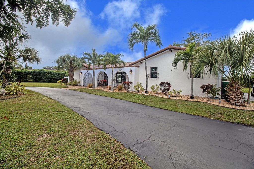 Photo of 11035 NW 26th Drive, Coral Springs, FL 33065 (MLS # F10532924)