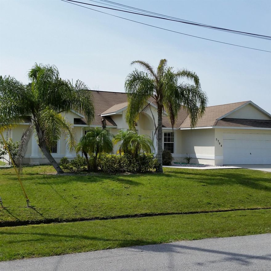 Wonderfully spacious 3/2 in Western Port St. Lucie. Open floor plan and a covered back porch make this home perfect for entertaining or just relaxing after a long day. Just minutes from I-95 and the great shopping on St. Lucie West Blvd, House is in the process of getting a new roof.There is also a $150 lease preparation/admin/walkthrough report fee. Mandatory $49.95 a month Resident Benefits Package, includes HVAC air filter delivery, credit building/reporting, $1M Identity Protection, Online Tenant Portal, Utility Concierge Service, Resident Rewards Program