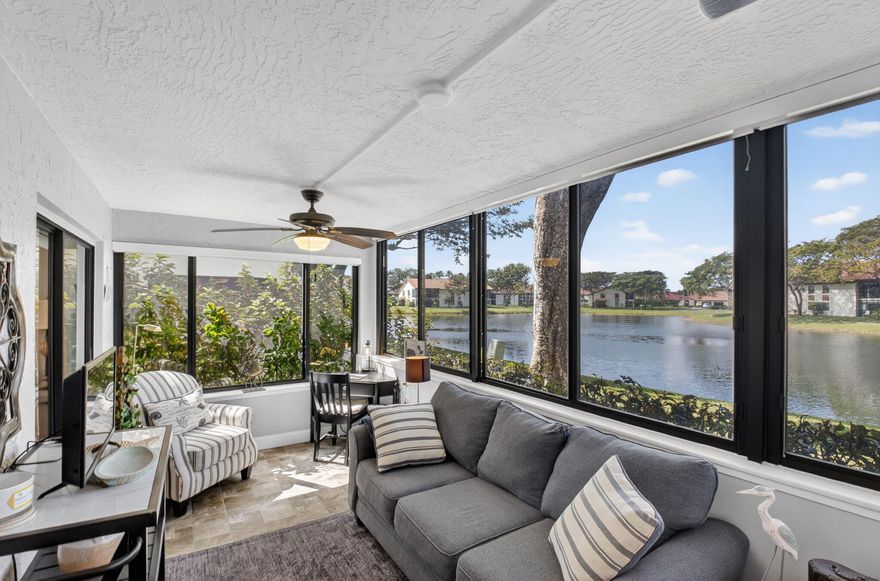 Resort-Style Living with Stunning Lake Views! Stunning 3-bedroom, 2-bath first-floor residence (configured as 2 bedrooms plus a den/optional 3rd bedroom) offering full impact windows, extra storage, and serene waterfront living in the heart of Boynton Beach.
This beautifully renovated, move-in-ready home is perfectly positioned in a picturesque lakeside setting. The chef's kitchenfeatures crisp shaker cabinetry, sparkling quartz countertops, stainless steel appliances, and a spacious layout.
The open-concept design flows effortlessly into the enclosed Florida room, where custom motorized blinds frame tranquil lake views -- the perfect place to enjoy peaceful mornings and relaxing evenings. The expansive primary suite is complete with a walk-in closet, additional wall closet, and a beautifully updated ensuite bath featuring dual vanities and elegant finishes. Two additional bedrooms (or den/flex space) provide versatility for guests, a home office, or hobbies.
Enjoy multiple outdoor spaces including the enclosed Florida room, front courtyard, and side patio -- embracing the best of South Florida's indoor-outdoor lifestyle. 
Full impact windows throughout provide energy efficiency, and storm protection.
Impeccably maintained and ideally located near shopping, dining, and major highways, this exceptional lakefront residence is more than just a home -- it's a lifestyle.

Don't miss your opportunity to own this slice of paradise.

Property Features:

*2 Bedrooms + Den/optional 3rd Bedroom - Versatile space for a home office or guest room
*Fully Renovated & Move-In Ready - Stylish, modern updates throughout
*Lakeside Location - Enjoy breathtaking water views
*Luxury Flooring - Laminate & porcelain tile throughout
*Chef's Kitchen - Shaker cabinetry, quartz countertops & stainless steel appliances
*Enclosed Florida Room - Impact sliders & custom motorized blinds for serene lake views
*Expansive Primary Suite - Walk-in closet, additional wall closet & spa-like ensuite bath
*Double Vanities in Primary Bath - Elegant finishes for a luxurious touch
*Multiple Outdoor Spaces - Florida room, front courtyard & side patio for ultimate relaxation
*Full Impact Windows - Peace of mind with storm protection
*Designer Upgrades - Modern elegance in every detail


*Community Features:

*Resort-Style Amenities
*Full Facility Clubhouse
*Auditorium
*Heated Pool & Hot Tub
*Tennis & Pickleball Courts
*Fitness Classes
*Billiards
*Ping Pong
*Bocce Ball
*Library
*Game Nights


*Social Clubs & Activities:

*Bridge Club
*Book Club
*Current Events Discussions
*Pickleball
*Tennis Club
*Knitting & Craft Club
*The "Dinner Out" Club
*Social Club & Community Events