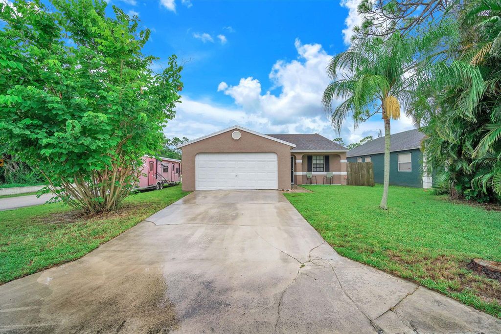 Photo of 5842 SE Pine Drive, Stuart, FL 34997 (MLS # R10905304)