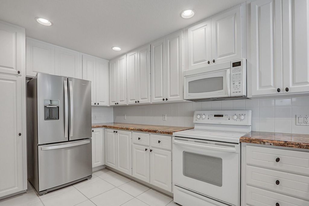 Photo of 174 Soriano Drive, Jupiter, FL 33458 (MLS # R11067720)