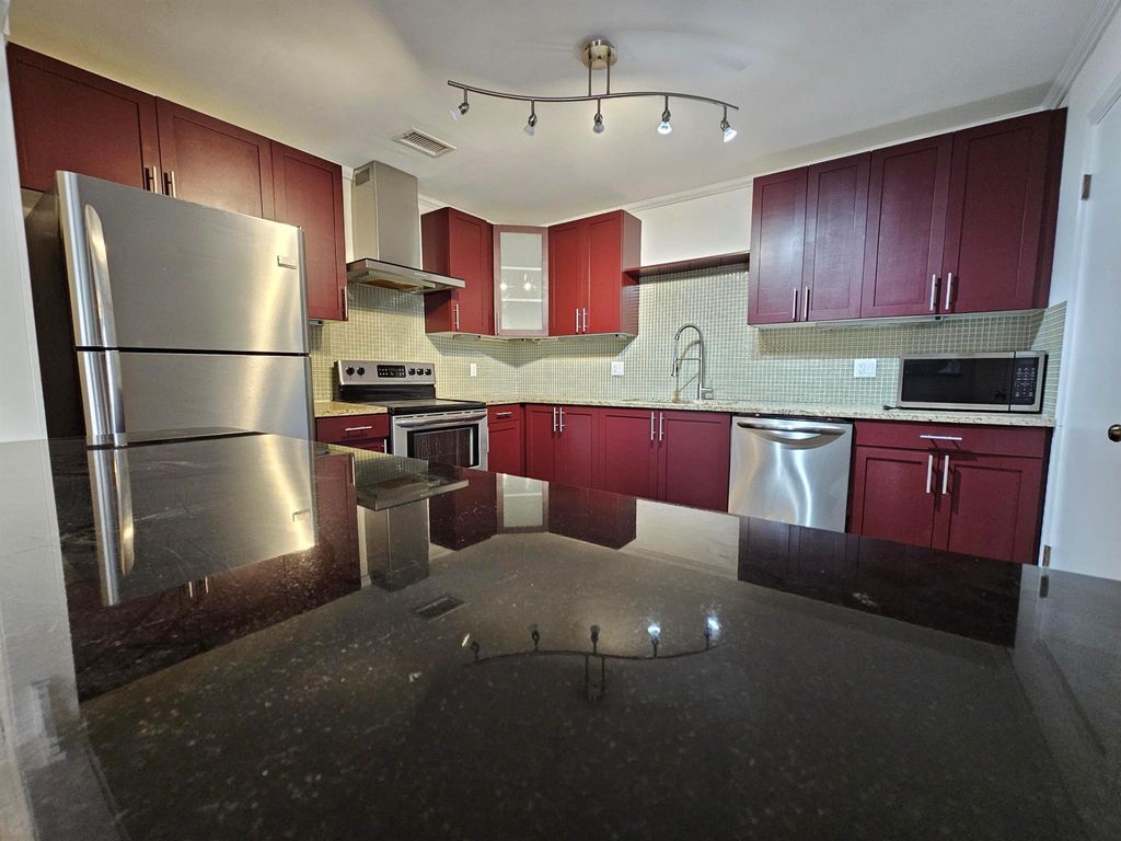 Photo of 8097 Ambach Way, Hypoluxo, FL 33462 (MLS # R11054682)