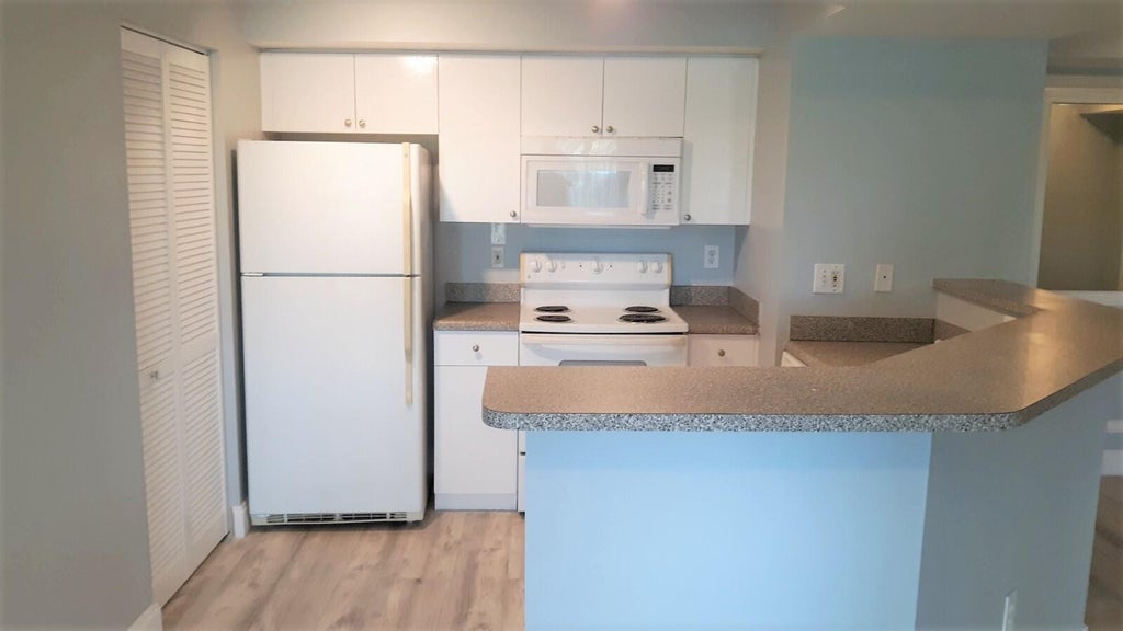 Photo of 3818 NW Adriatic Lane #1-308, Jensen Beach, FL 34957 (MLS # B26055630)