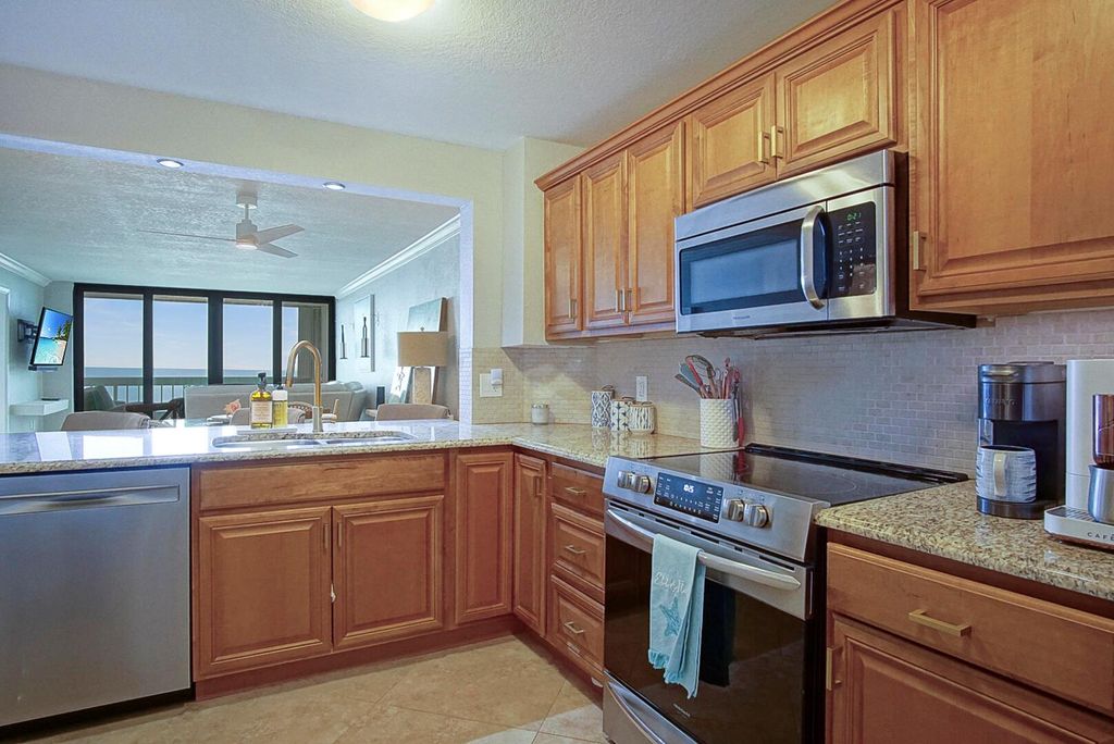 Photo of 9940 S Ocean Drive #304, Jensen Beach, FL 34957 (MLS # R10903851)