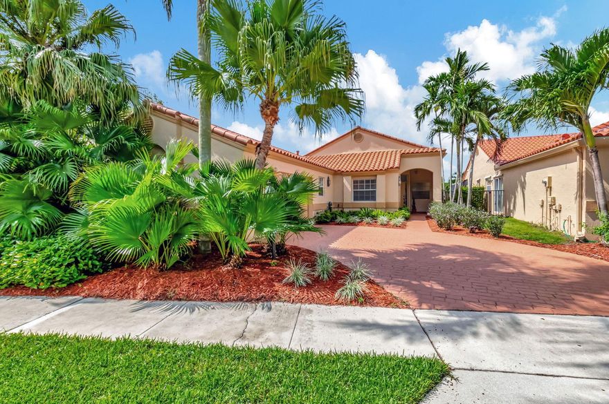 Indulge in luxury living with this beautiful Mediterranean-style home boasting captivating lake views and an array of resort-like amenities. Situated in the prestigious, gated community, Brentwood of Boca, this beautiful property offers the perfect blend of elegance and comfort. At your front door, you are greeted by the cool elegance of ceramic tile flooring that flows seamlessly throughout the main living areas. The spacious living area features soaring vaulted ceilings and large sliding doors, bathing the space in natural light and offering picturesque views of the serene lake. The heart of the home is the beautiful, large white kitchen with newer stainless steel appliances, this gourmet kitchen is as stylish as it is functional. See More comments for addl information.