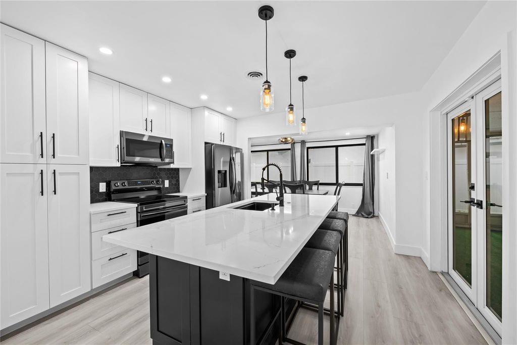 Photo of 2634 NW 52nd Court, Fort Lauderdale, FL 33309 (MLS # B26016681)