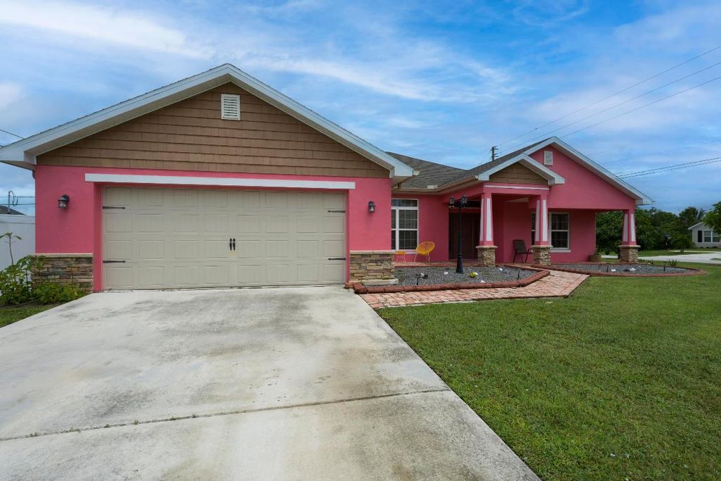 Photo of 5000 NW Edgarton Terrace, Port Saint Lucie, FL 34983 (MLS # R11107890)