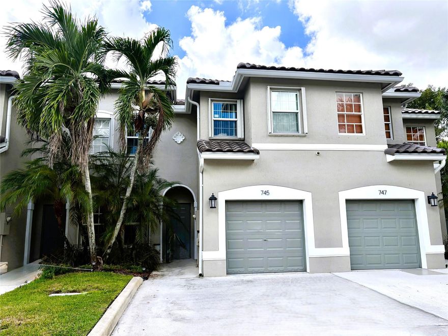 Welcome to this stunning townhouse located in the highly sought-after Plantation Trace community. This 3-bedroom, 2.5-bathroom home offers a perfect blend of comfort, style, and convenience. Step into a spacious interior featuring an layout that seamlessly connects the living, dining, and kitchen areas. The kitchen boasts modern stainless-steel appliances, ample counter space. All three bedrooms are upstairs, The primary suite features a beautifully bathroom with dual sinks and a luxurious shower. Also includes laundry room for added convenience and a guest half-bath located on the first floor. Enjoy Tile floors on the first floor and wood laminate upstairs. Additional updates include a new roof, newer AC, hurricane Impact Doors and Windows for peace of mind.