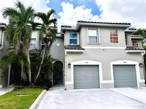 Photo of 745 NW 132nd Ter #745, Plantation, FL 33325 (MLS # F10533243) Photo of 745 NW 132nd Ter #745, Plantation, FL 33325 (MLS # F10533243)