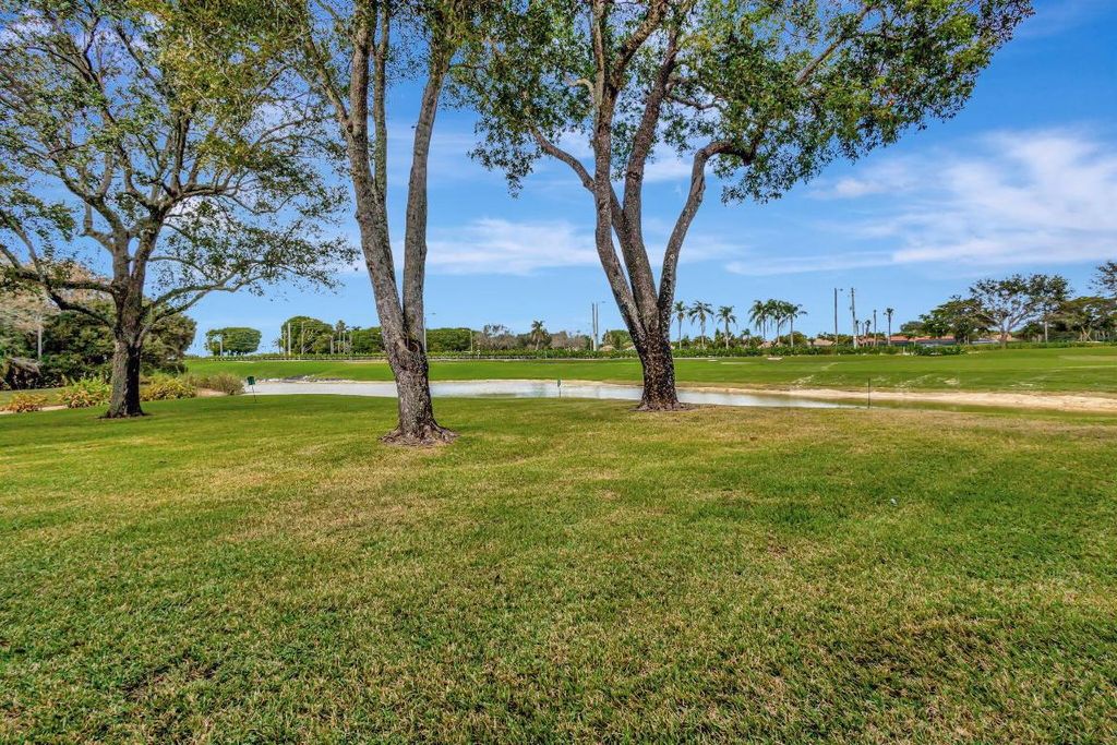 Photo of 10315 N Andover Coach Lane #A2, Lake Worth, FL 33449 (MLS # R11124754)