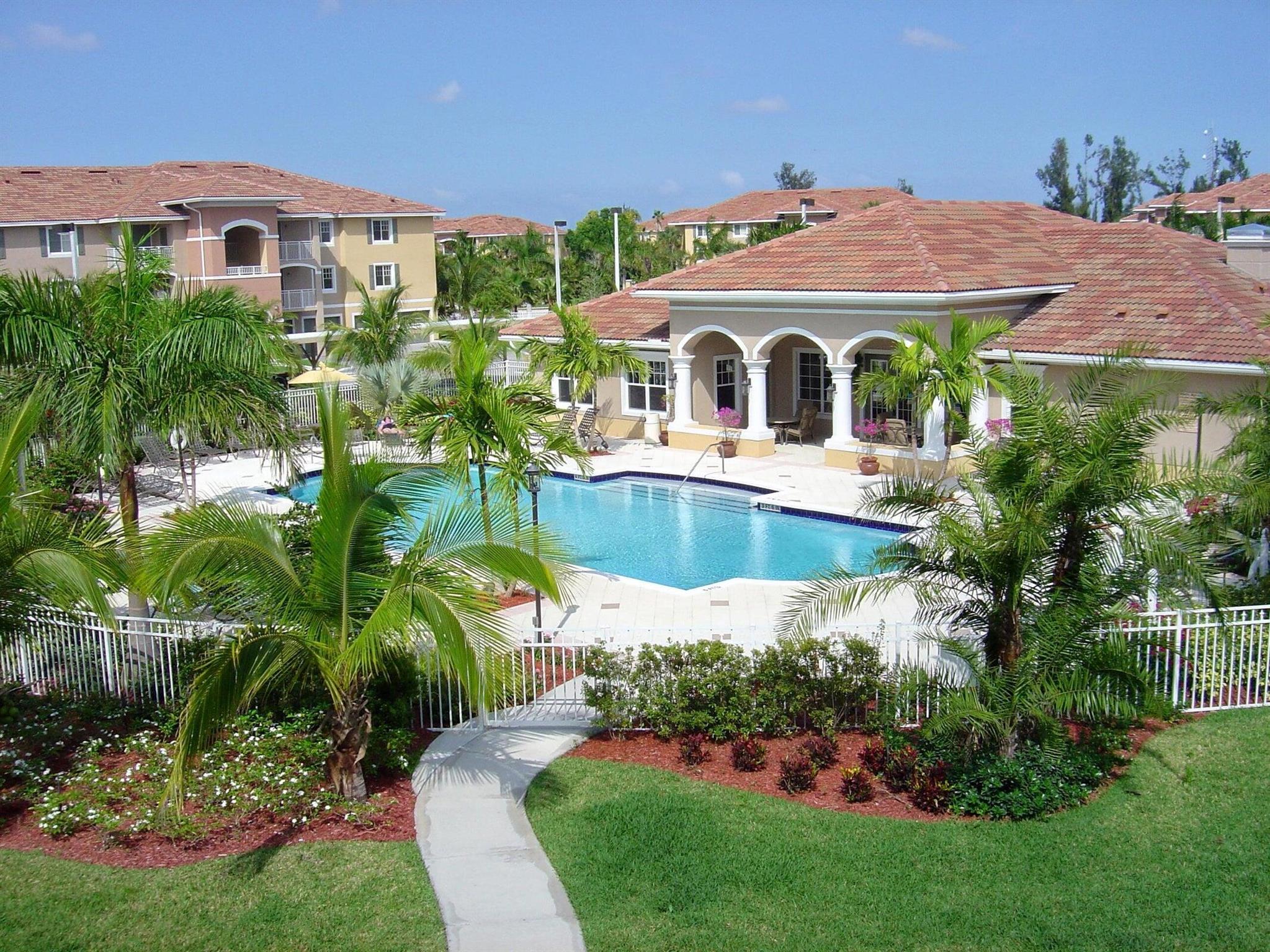 Freshly painted private condo backing to preserve and golf course. This 2 bedroom 2 bath has tiled floors in main living area and laminate floors in bedrooms, impact windows, tiled balcony with storage closet, Spacious kitchen with granite counters and laundry closet. Includes range, dishwasher and new microwave, refrigerator, washer and dryer and water heater. The HVAC is also new. The Villas at Emerald Dunes has two swimming pools, clubhouse, gym, tennis courts and billiard room. It is conveniently located near the PBI airport, turnpike, I95, downtown, CityPlace, and the beautiful South Florida Beaches.