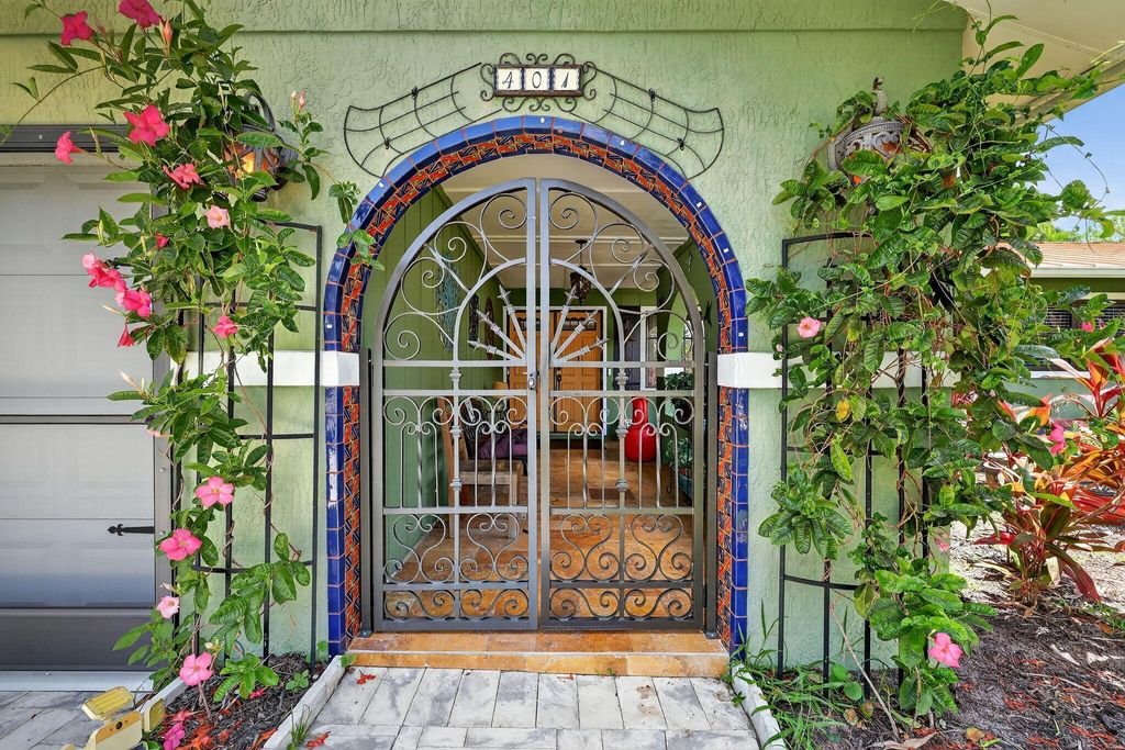 Photo of 401 NE Oleander Avenue, Port Saint Lucie, FL 34952 (MLS # R11110462)