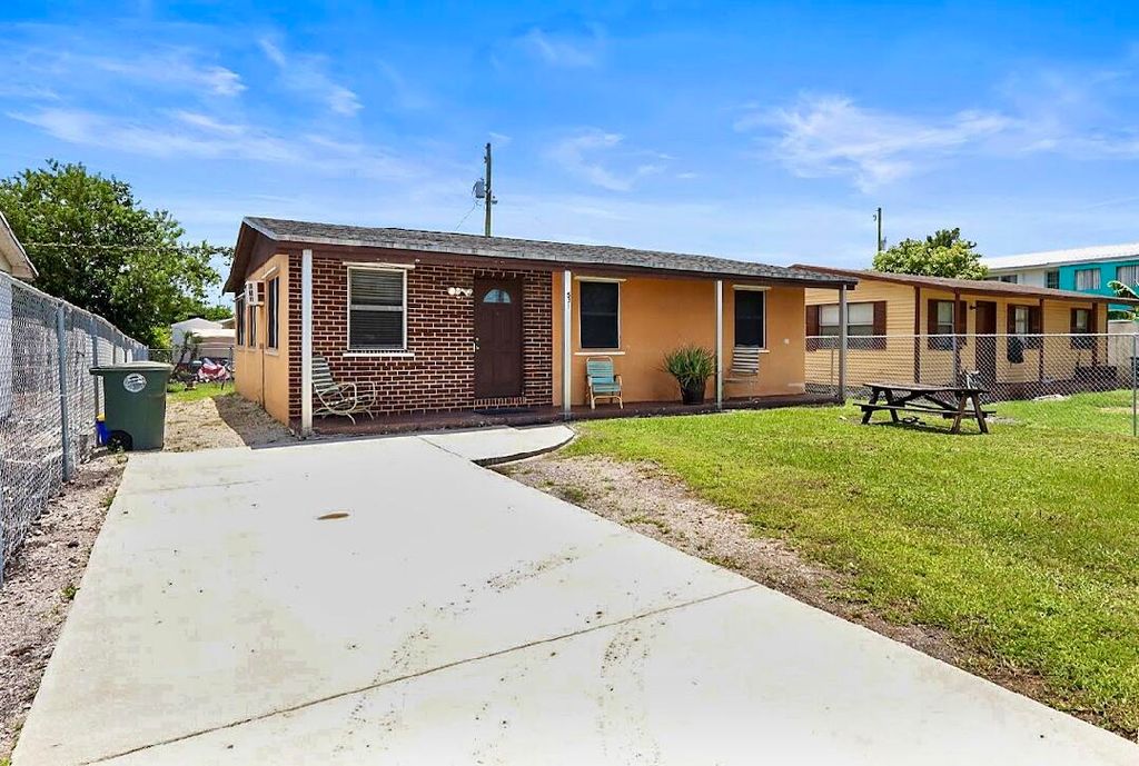 Photo of 531 SW 4th St, Belle Glade, FL 33430 (MLS # R11109362)