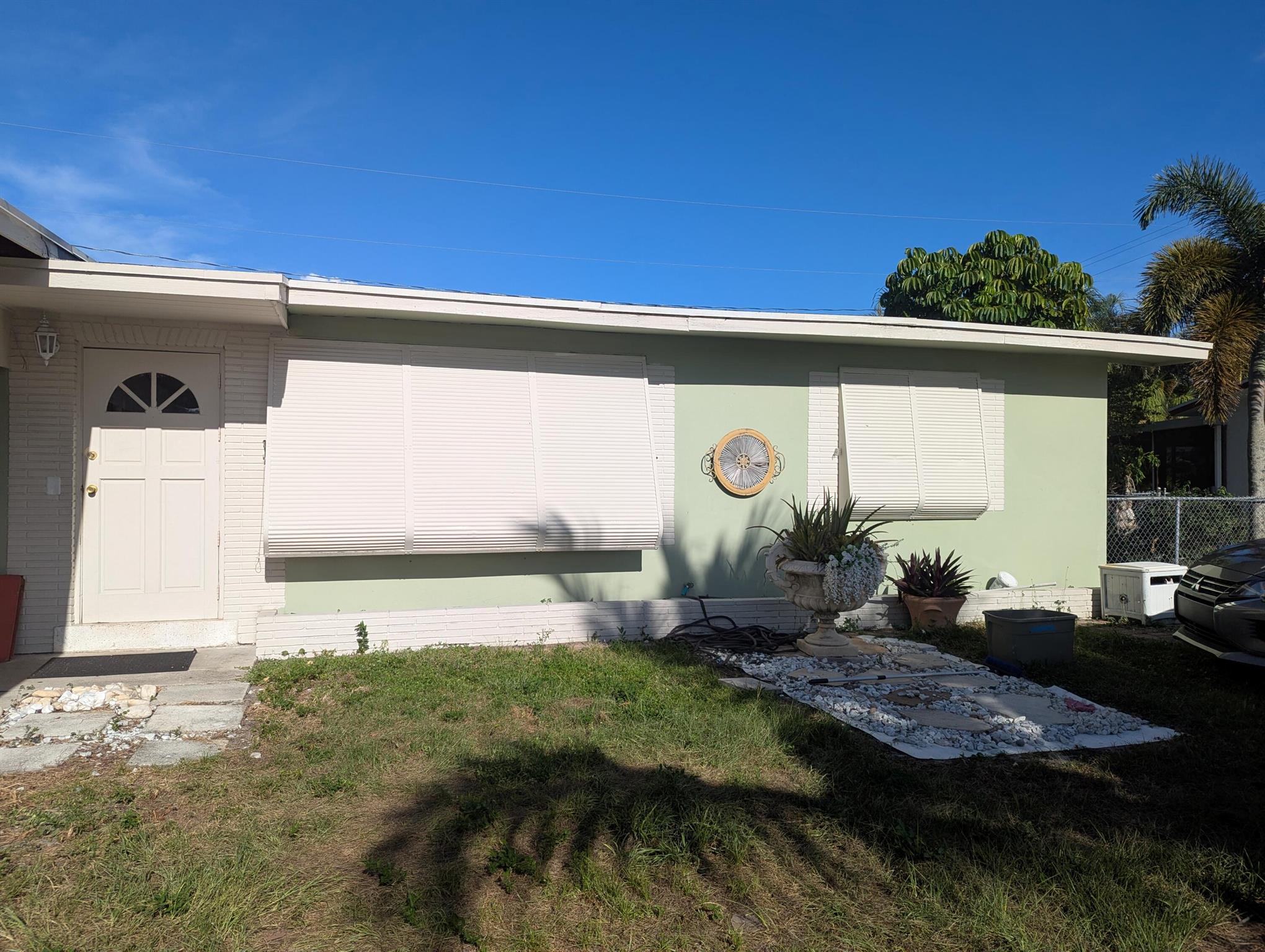 GREAT INVESTMENT! SINGLE FAMILY HOME WITH 3 BEDROOMS 2 BATHS AND CARPORT. A LARGE LOT AND FENCED BACKYARD. NO HOA CARPORT COULD BE CONVERTED TO A GARAGE