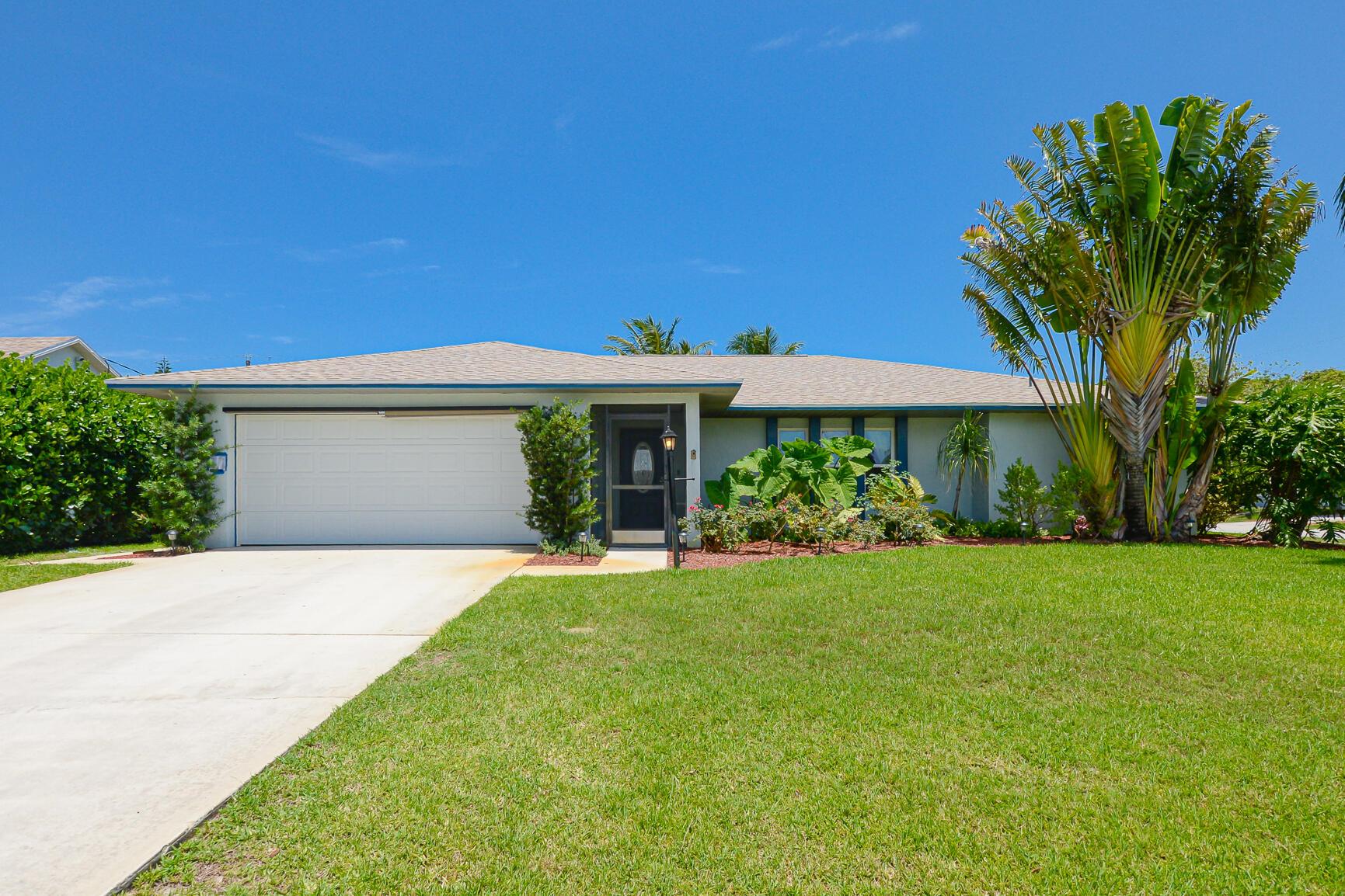 Move in ready! New roof, new HVAC and new hot water heater. 3/2/2 CBS home featuring a large living room, dining room, breakfast nook and family room. Remodeled kitchen and bathrooms. The heated pool has been converted to salt water and includes an automatic pool cleaner. New pool screens and impact windows. Oversized lot that is beautifully landscaped with a fenced back yard and a butterfly garden. This home is a must see with a great location! East of Route 1 and no HOA. Close to beaches, shopping & Jensen Beach.