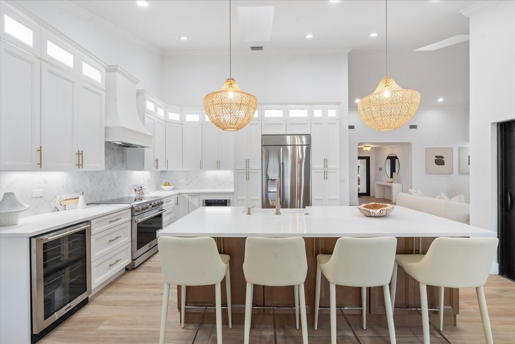 Photo of 24 Dunbar Road, Palm Beach Gardens, FL 33418 (MLS # R11161250)