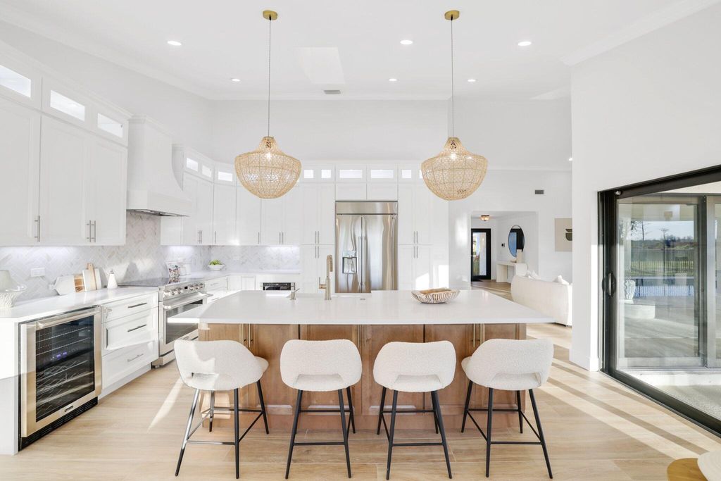 Photo of 24 Dunbar Road, Palm Beach Gardens, FL 33418 (MLS # R11161250)