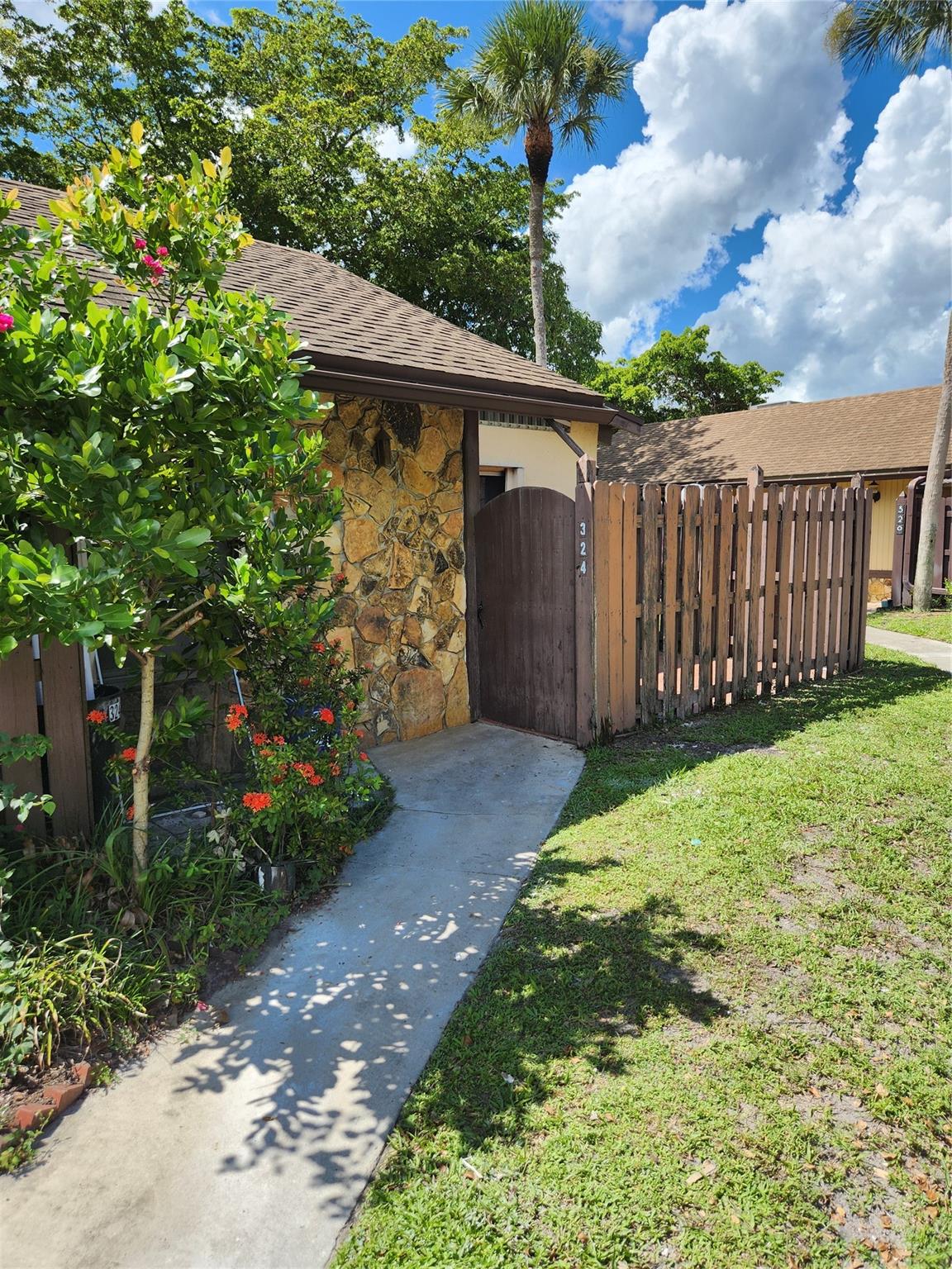 Fully remodeled ,new kitchen and appliances, washer and dryer, ceramic floors throuout.,Wrap around screened patio overlooking canal, Great clubhouse offering bingo, card rooms, main pool, courtesy bus, ,trips, 2 miles from Hardrock Casino,,across the street from Publix, banks, restaurants, houses of worship