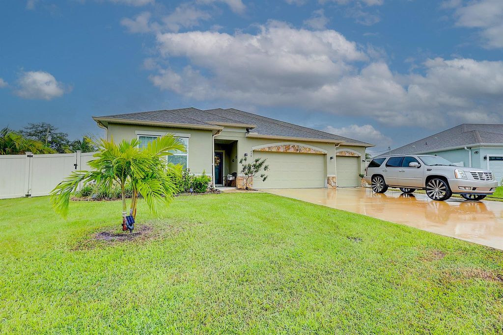 Photo of 438 SW Naftal Place, Port Saint Lucie, FL 34953 (MLS # R10904654)