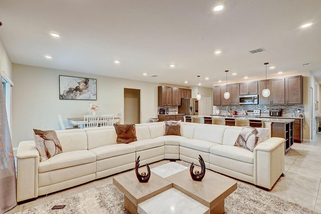 Photo of 438 SW Naftal Place, Port Saint Lucie, FL 34953 (MLS # R10904654)