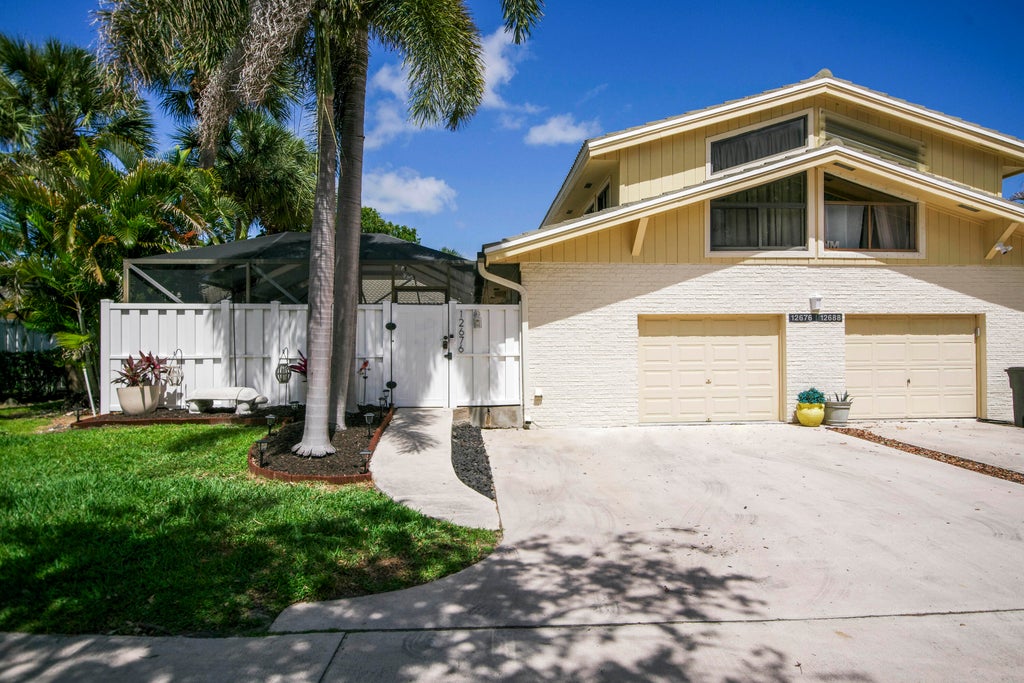 Photo of 12676 Woodmill Drive, Palm Beach Gardens, FL 33418 (MLS # B26025037)