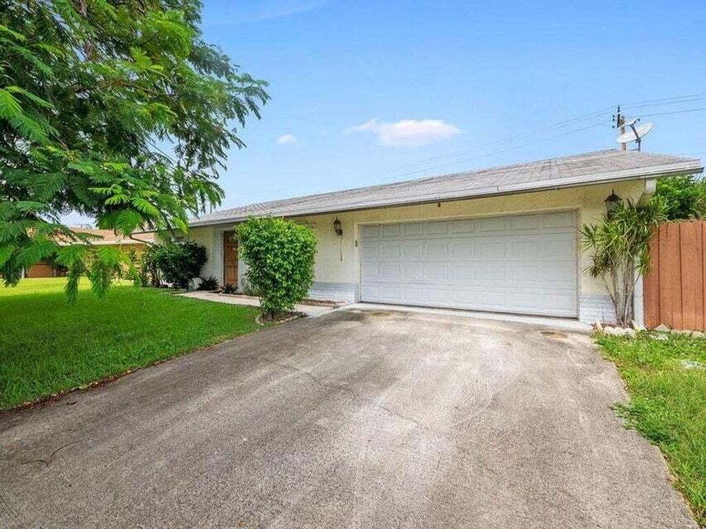 Photo of 6088 Plains Drive, Lake Worth, FL 33463 (MLS # R11112400)