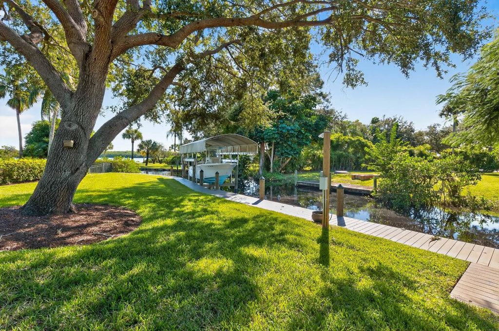 Photo of 802 SE Portage Avenue, Port Saint Lucie, FL 34984 (MLS # R11141458)