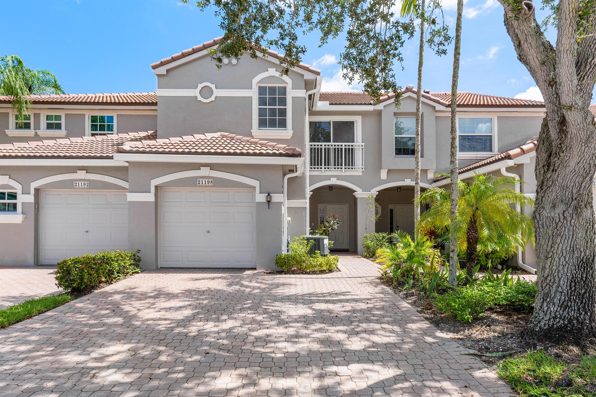 This remodeled 3-bedroom, 2.5-bathroom 1 car garage townhouse is located in a gated community in one of Boca Raton's top school districts. The home features modern vinyl flooring, high ceilings, and fresh paint throughout. The upgraded kitchen has sleek finishes, and all 3 bathrooms feature modern vanities and LED-light mirrors. The community is family-friendly with great amenities, making it ideal for anyone looking for a comfortable, move-in-ready home in an excellent location. You are located close to the turnpike, stores, restaurants and a short drive to downtown Boca Raton. Photo's Virtually Staged.