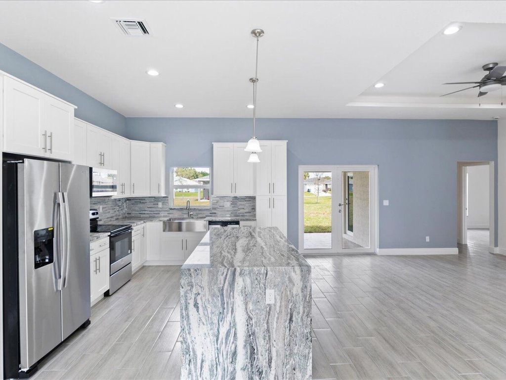 Photo of 5806 Tangelo Drive, Fort Pierce, FL 34982 (MLS # R11118786)