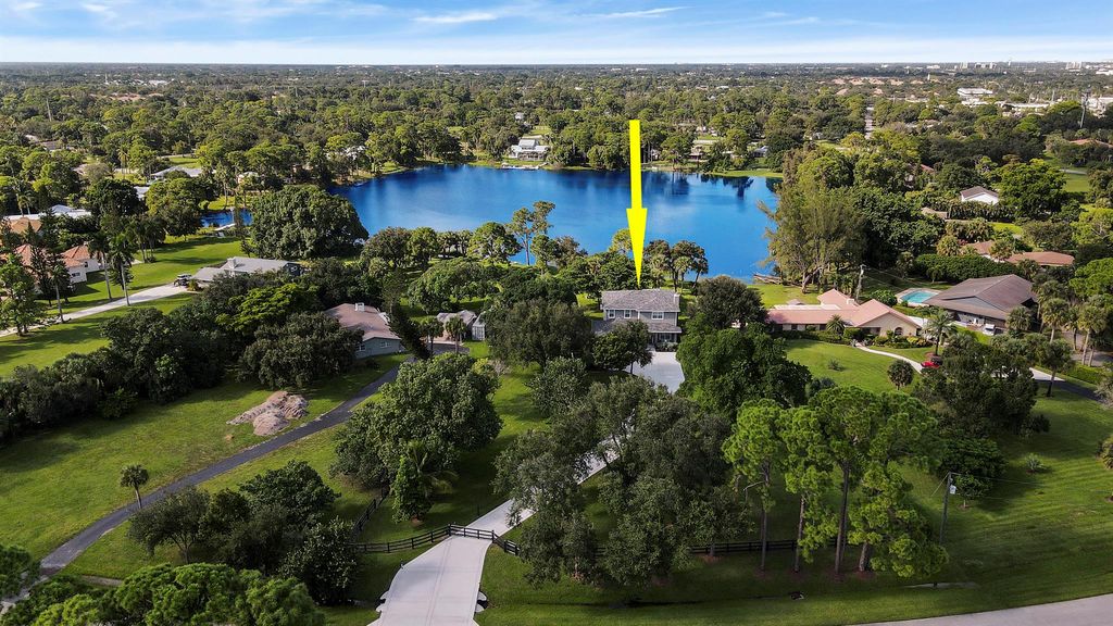 Photo of 4645 Square Lake Drive, Palm Beach Gardens, FL 33418 (MLS # R10907877)