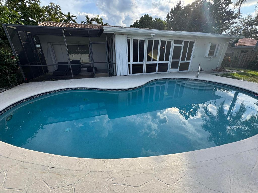 Photo of 1385 NW 6th Street, Boca Raton, FL 33486 (MLS # R11162228)