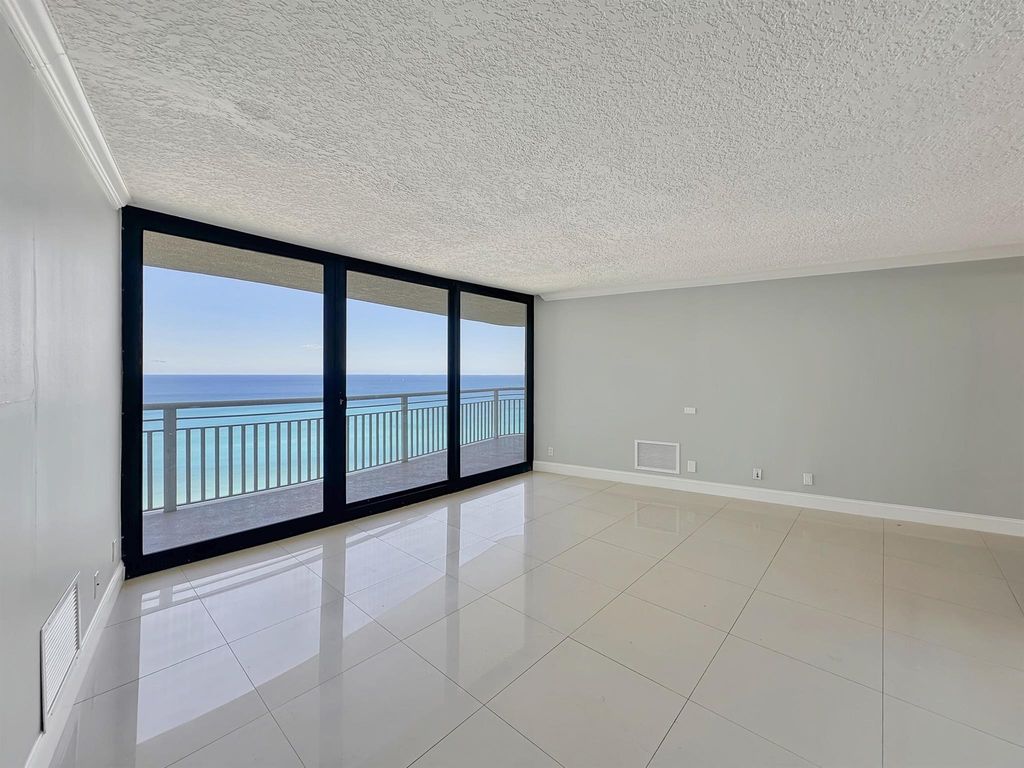 Photo of 3000 N Ocean Drive #23-E, Singer Island, FL 33404 (MLS # R11045029)