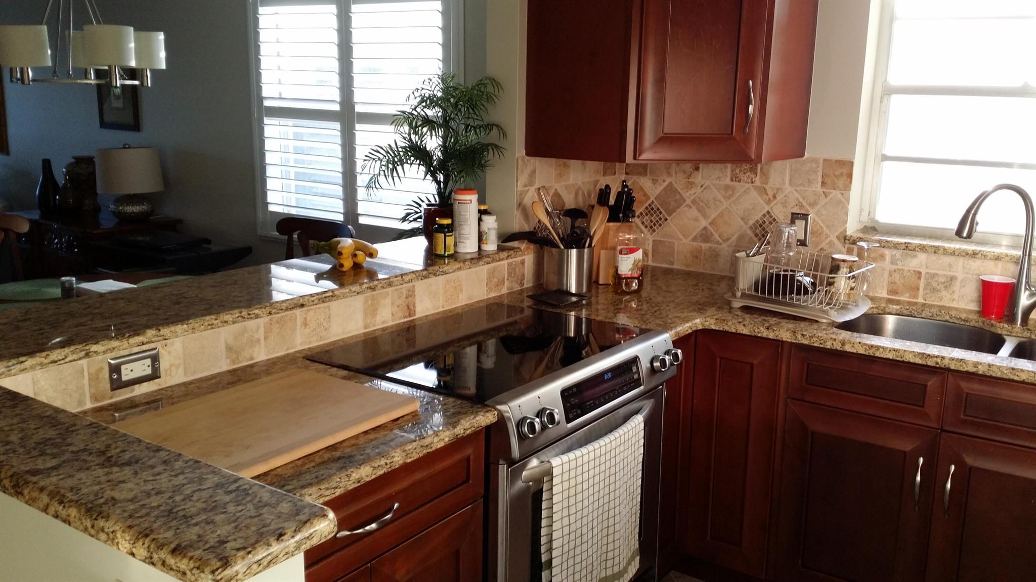 ***MUST BE 55 YEARS OR BETTER TO LIVE IN VISTA DEL LAGO***Beautifully updated & appointed is this furnished 2nd floor condo apartment. As an end unit there are additional windows allowing for more natural light into the condo. 2nd floor unit allows more security & serenity. Upgrades include tiled floors, wood cabinets in kitchen & baths, granite counters, stainless appliances in kitchen, & both baths have newer tiled walls around shower & tub. FL RM spans the width of the condo off the master bedroom & Living room which allows for anyone to spend time enjoying the great FL weather. Interior walls were professionally painted recently. Easy to show vacant on combo lock box.