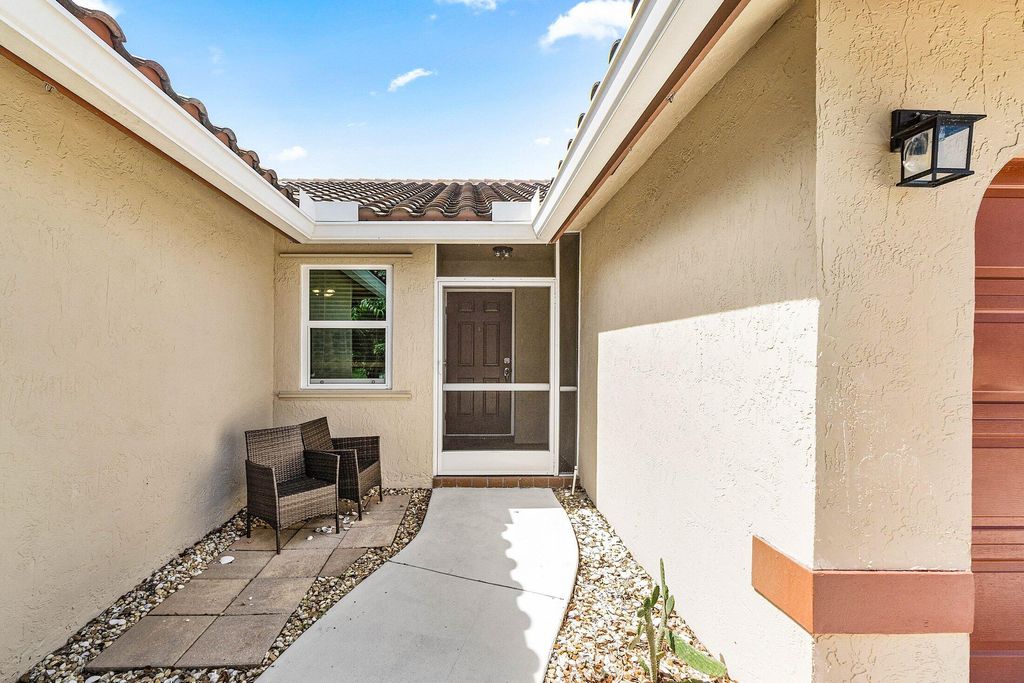 Photo of 5155 Rosen Boulevard, Boynton Beach, FL 33472 (MLS # R11107870)